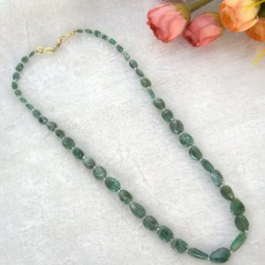 EMERALD OVAL ITH PEARLS