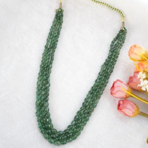 GREEN SEMI OVAL UNCUT BEADS